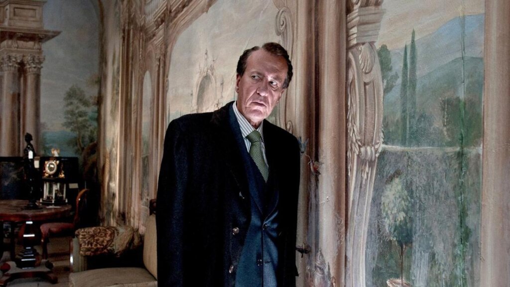 Virgil looks distrustfully next to a beautiful fresco in The Best Offer (2013).