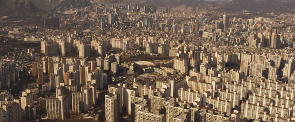 A dense field of Seoul apartment towers in Concrete Utopia
