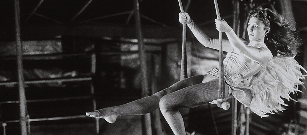 Trapeze artist Marion performs beneath a circus tent in Wings of Desire