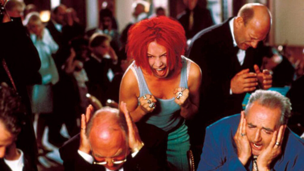 Lola screams beside a roulette table as startled gamblers cover their ears in Run Lola Run.