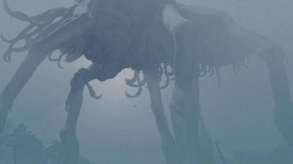 The giant Behemoth towers over the road in The Mist (2007)