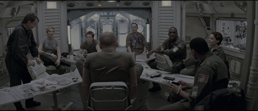 Captain Miller briefs the Lewis and Clark rescue crew in Event Horizon (1997)