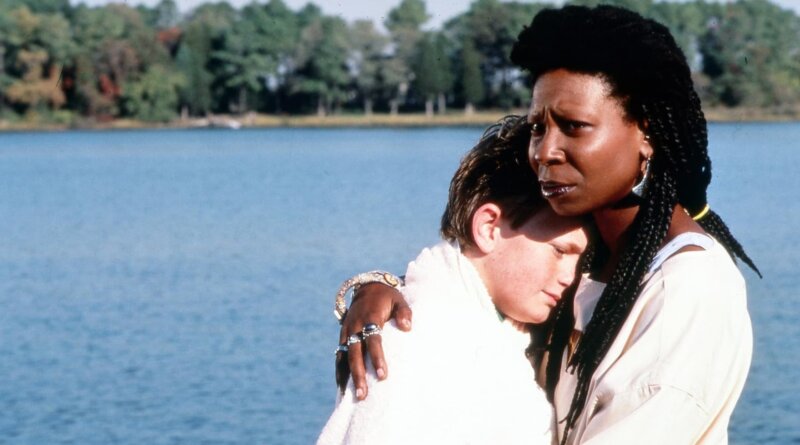 Clara holds David beside the lake in Clara’s Heart (1988).