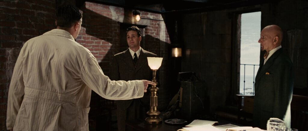 Andrew Laeddis faces Dr. Sheehan and Dr. Cawley inside the lighthouse.