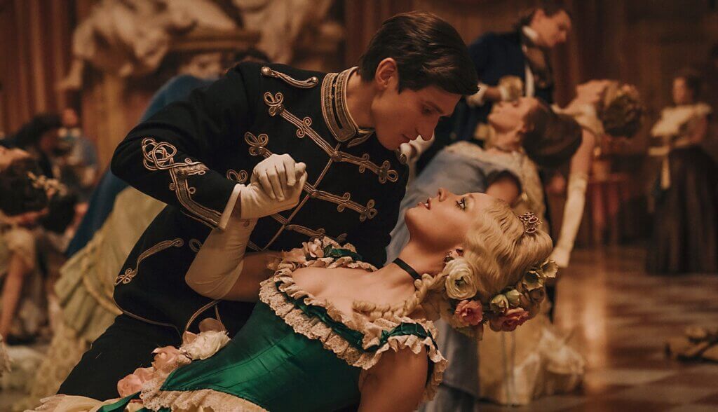 The prince and Cinderella dance at the ball.