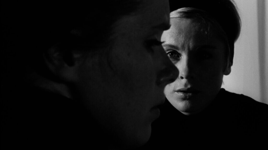 Alma and Elisabet’s faces overlap in a black-and-white image from Persona.