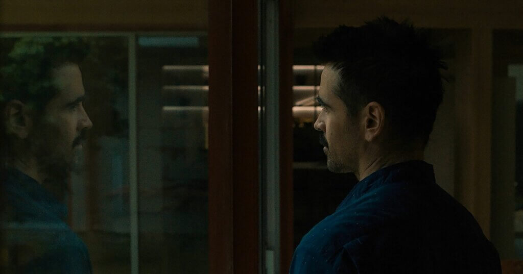 Jake studies a reflection through glass in After Yang.