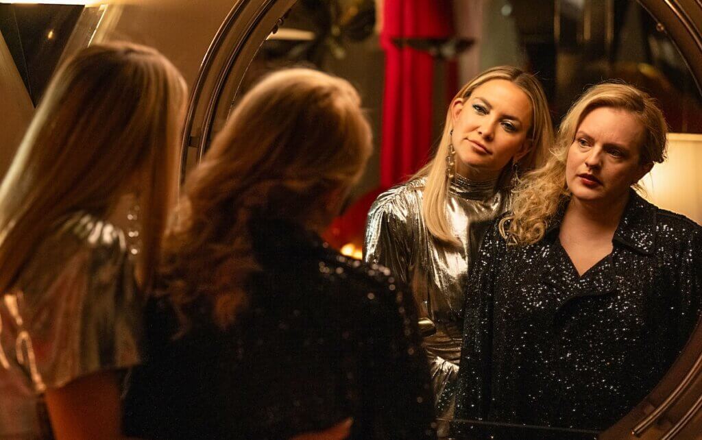 Zoe Shannon (Kate Hudson) and Samantha Lake (Elisabeth Moss) look into a large round mirror in Shell (2025).