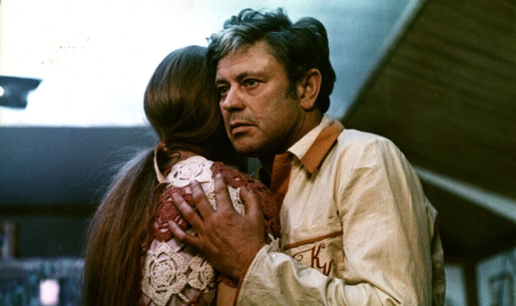Kelvin embraces Hari aboard the space station in Solaris.