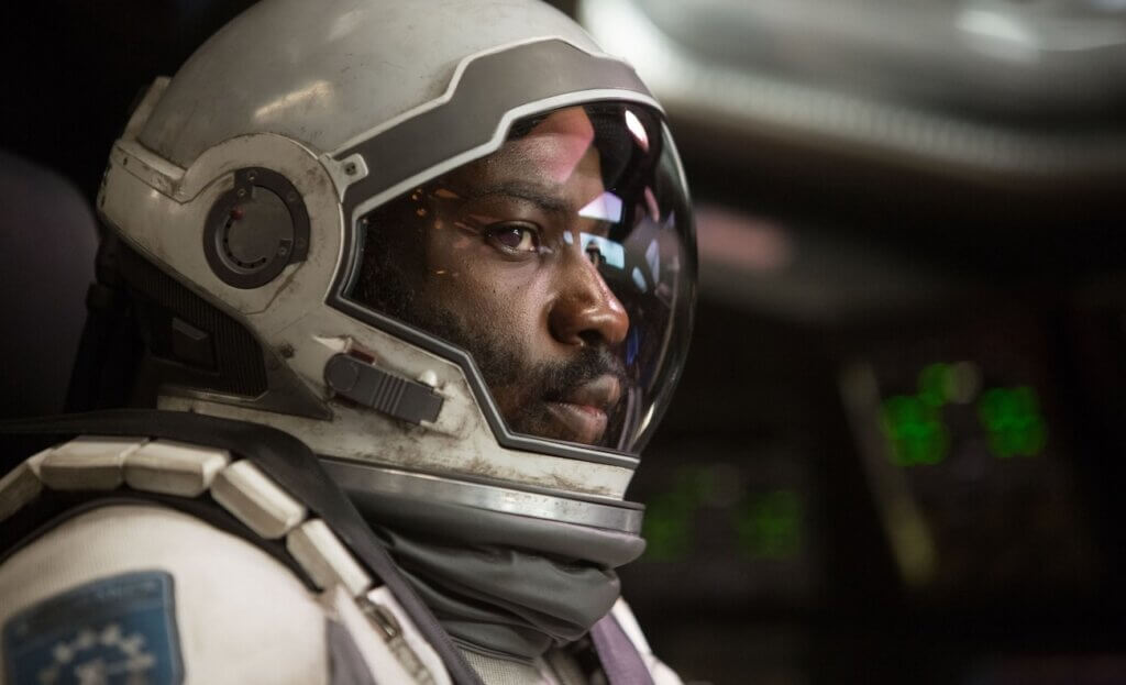 Romilly wears a spacesuit during the Interstellar expedition